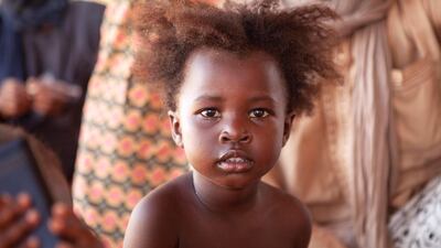 Attayoub with his daughter Bushra. She is a smart young girl of 5 and she wants to go to school. Jerry de Mars / UNHCR