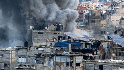 Smoke rises from buildings bombed by Israel in Rafah, in the south of the Gaza Strip, on Tuesday. AFP