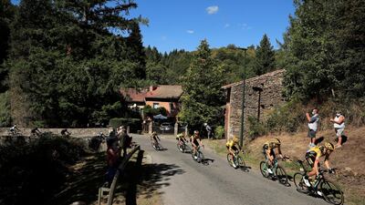 Yellow jersey holder Primoz Roglic, third right, of Team Jumbo-Visma during Stage 12. EPA