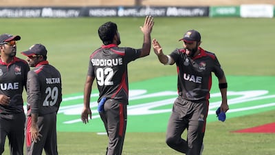 Junaid Siddique after the wicket of Kyle Coetzer. Chris Whiteoak / The National