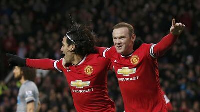 Wayne Rooney (R) celebrates after scoring against Newcastle with team-mate Radamel Falcao during their English Premier League encounter on December 26. Phil Noble/Reuters