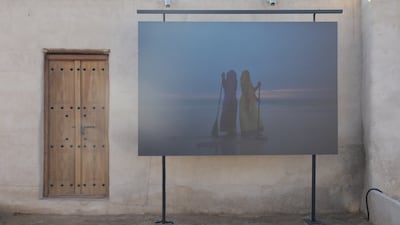 A piece on display at Al Jazirah Al Hamra Heritage Village, where a labyrinth of outdoor exhibition passageways will show work from local and international artists until March 31.