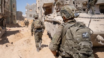 Israeli troops operating on the ground in the Gaza Strip AFP)