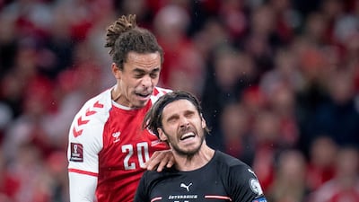 Denmark's Yussuf Poulsen in action with Austria's Christopher Trimmel Liselotte. Reuters