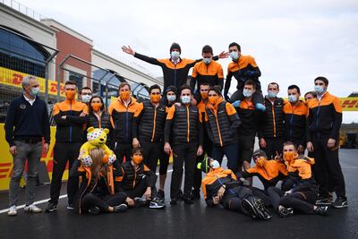 Lando Norris with his McLaren team on the grid after the Turkey Grand Prix. Getty