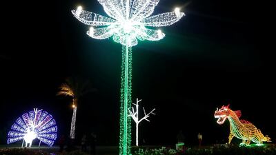 Egyptians and tourists walk around illuminations in various shapes ahead of New Year celebrations, at the pedestrian area of Soho Square in the Red Sea resort of Sharm el-Sheikh, south of Cairo, Egypt. Reuters