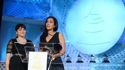 Anoushka Shankar, right, and Norah Jones accept a Grammy on behalf of their late father Ravi Shankar. Michael Kovac / WireImage