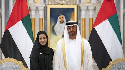 Sheikh Mohamed bin Zayed, Crown Prince of Abu Dhabi and Deputy Supreme Commander of the UAE Armed Forces (R), stands for a photograph with Sara Awad Issa Musallam, Chairperson of the Department of Education and Knowledge and Abu Dhabi Executive Council Member (L), during the swearing-in ceremony for new members of the Abu Dhabi Executive Council, at the Presidential Palace. Ministry of Presidential Affairs