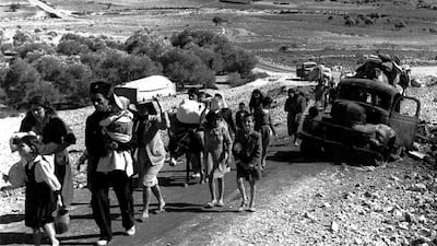 Palestinian refugees stream out of Palestine on the road to Lebanon in northern Israel to flee fighting in the Galilee region in the Arab-Israeli war on November 4, 1948. AP Photo