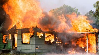 When the Richardson family home burns down, suspicions arise in suburbia, in Celeste Ng’s second novel. Getty Images