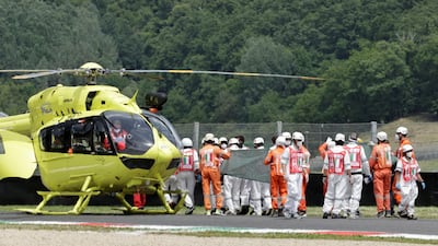 Moto3 rider Jason Dupasquier is carried to an helicopter after crashing during qualifying in Italy. He later succumbed to his injuries. Reuters