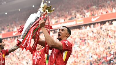 Liverpool's Trent Alexander-Arnold with the Premier League trophy after the final game of the season. EPA