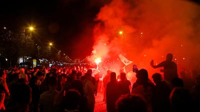 PSG supporters invade the Champs-Elysee after the Champions League defeat. AP