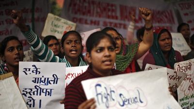Protesters mark the first anniversary of the Delhi gang rape which caused an outpouring of anger across India. Adnan Abidi / Reuters