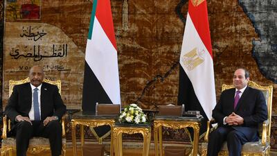 Egyptian President Abdel Fattah El Sisi, right, receives Sudan's military leader Gen Abdel Fattah Al Burhan in Cairo last March. AFP