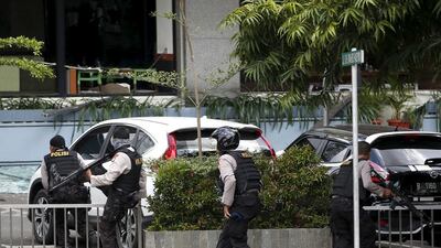 Indonesian police advance during last month's gun and suicide bomb assault in central Jakarta last month. Darren Whiteside/Reuters