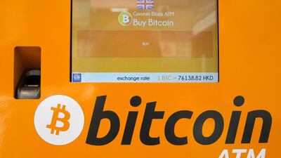 A Bitcoin ATM in Hong Kong. The price of Bitcoin had dipped about 70 per cent since December peak. AP