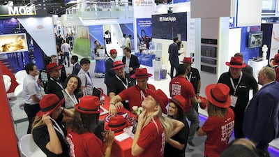 Visitors at the Redhat stand during the 37th Gitex Technology Week at the World Trade Centre in Dubai. Satish Kumar for The National