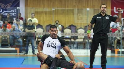 Ricardo Evangelista, on his way to victory over Pedro Duarte, in the open final at the Armed Forces Officers Club in Abu Dhabi. Mona Al-Marzooqi/ The National