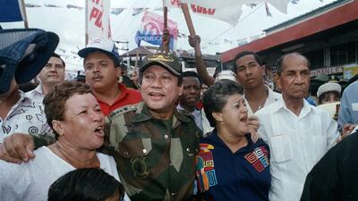 Manuel Antonio Noriega walks with supporters in the Chorrilo neighbourhood of Panama City in May 1989. John Hopper / AP Photo / File