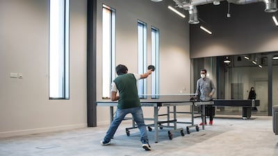 Abdul Aziz and Mohammed Ehsan Ullah Khan, students at 42 Abu Dhabi, take a break in the games area.