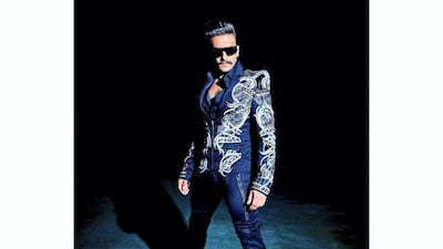 Singh most recently sported this strong-shouldered Julien McDonald suit for the 'GQ India' style awards. Instagram / Ranveer Singh