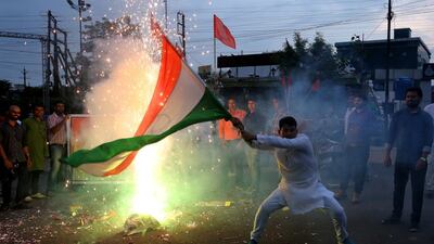 A right-wing Indian student organisation celebrates following reports that the Indian government will remove the special status given to the Indian-administrated Kashmir. EPA