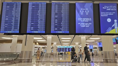 Dubai International Airport. Employers are required to approve leave requests before a staff member can take time off work. AFP