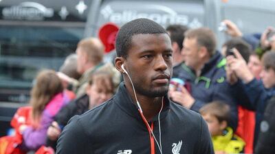 Georginio Wijnaldum of Liverpool arrives at Turf Moor before his team's match with Burnley on August 20, 2016 in Burnley, England. Mark Runnacles / Getty Images
