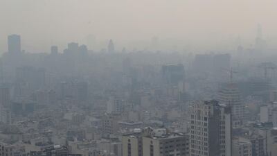 Air pollution obscures the skyline in Tehran on November 30, 2019. Authorities in the Iranian capital closed schools and universities because of the toxic air. AP Photo