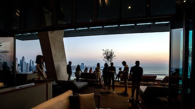 The evening brunch at Aura Skypool offers spectacular views of the Dubai skyline. Victor Besa / The National
