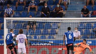 Spanish forward Joselu scores the Alaves goal.