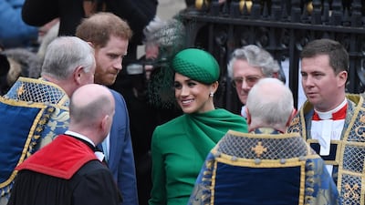 Britain's Prince Harry, the Duke of Sussex and his wife, the Duchess of Sussex leave the annual Commonwealth Service at Westminster Abbey. EPA