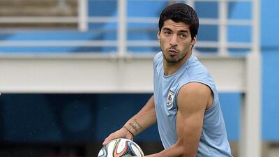 Luis Suarez shown during a Uruguay training session on Monday ahead of their Tuesday match with Italy at the 2014 World Cup in Brazil. Daniel Garcia / AFP / June 23, 2014