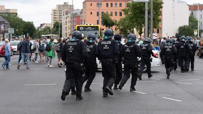 The Reichsbuerger and assorted conspiracy theorists were linked to anti-lockdown protests in Germany. AFP