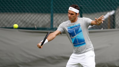 Roger Federer begins his pursuit of an eighth Wimbledon title against Alexandr Dolgopolov on Centre Court. Peter Klaunzer / EPA