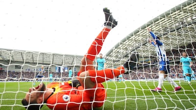 Tottenham Hotspur goalkeeper Hugo Lloris screams out in agony after injuring his arm against Brighton on Saturday. Getty