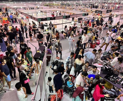 Shoppers browse discount stock during Coca-Cola Arena’s 2022 clearance sale in Dubai. Photo: Coca-Cola Arena