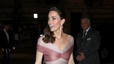 The Duchess of Cambridge wears a rose-pink Gucci gown as she arrives at a gala dinner in aid of Mentally Healthy Schools at the Victoria and Albert Museum in London on February 13. The romantic, floating dress is accessorised with Oscar de la Renta pumps, a Prada clutch and Kiki McDonough earrings. AP