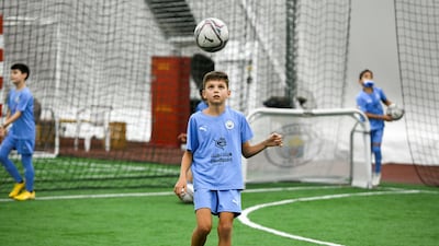 Players aged 3 to 16 can play atbCity Football Schools. Khushnum Bhandari / The National