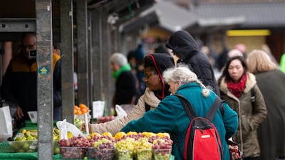 Shoppers at a fruit and vegetable market in Leeds. EPA