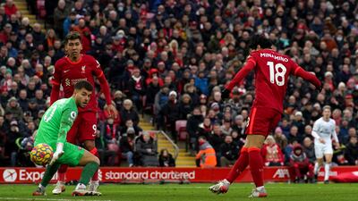 Takumi Minamino scores Liverpool's third goal against Brentford. PA