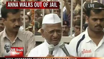 August 19, 2011: In this frame grab from Indian television channel NDTV, Indian social activist Anna Hazare (C) addresses a crowd of supporters after he walked from Tihar Jail in New Delhi. AFP PHOTO/HO/NDTV