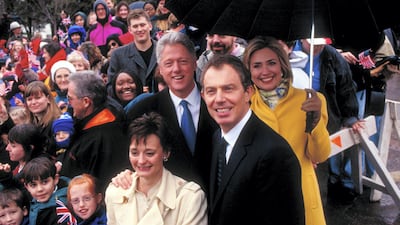 Crowds watch on as Tony and Cherie Blair visit Washington with then US President Bill Clinton and First Lady Hillary Clinton. Getty Images