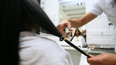 Choosing to use a local hairdresser can be a sign that you feel at home. Mike Young / The National