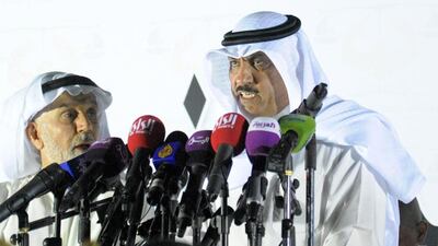 Former opposition lawmaker Musallam Al Barrack, right, gives a speech in Kuwait City on June 10, 2014. Gustavo Ferrari/AP Photo