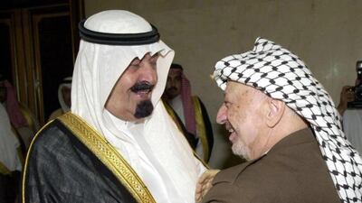 Palestinian Authority President Yasser Arafat right with Abdullah in Jeddah. Omar Al Rashidi / AFP Phoyo