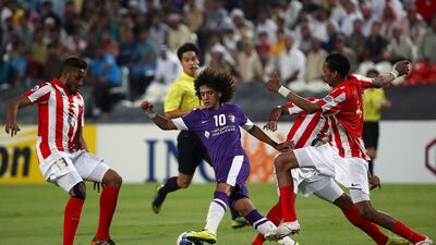 MIDFIELD - OMAR ABDULRAHMAN (Al Ain): This season, we have seen some excellent playmakers in action, such as Al Jazira’s Abdelaziz Barrada, Ajman’s Simon Feindouno, Luis Jiminez for Al Ahli, Al Wahda’s Damian Diaz and Kim Jung-woo at Sharjah. But with Abdulrahman available, there is really no need to look at the foreign contingent. Injuries did restrict his appearance in the AGL to 17 matches, but his performance against Al Jazira in the Asian Champions League last week showed why some of Europe’s top clubs are keeping tabs on him. Marwan Naamani / AFP