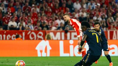 Vinicius Junior scores from the penalty spot to pull Real Madrid level at 2-2. EPA