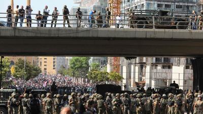 Lebanese soldiers stand guard during the demonstration in central Beirut. AFP